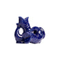 The Original Gluggle Jug Fish Salt & Pepper Shakers in dark blue are displayed on a white background, inspired by the iconic Gluggle Jug design.