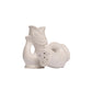 The Original Gluggle Jug Fish Salt & Pepper Shakers feature two white ceramic, fish-shaped pieces—one upright, one on its side—for a charming handmade set inspired by the classic jug and crafted in England.