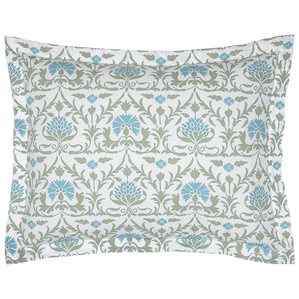 The John Robshaw Vidya Leaf Bedding Collection pillowcase features regal blue and sage blooms in a repeating floral pattern on a crisp white background.