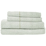 The John Robshaw Cinde Sage Bedding Collection features neatly folded green and white leaf-patterned cotton percale sheets and pillowcases in the charming Cinde print.