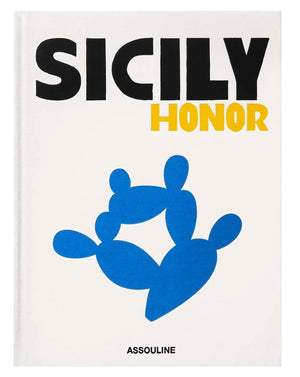 The "Sicily Honor" coffee table book from Assouline features bold black and yellow text with an abstract blue graphic on a white cover—a striking addition to any collection.