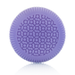 A round, purple object with a patterned surface of interlocking circles and lines from the Baobab Collection Gentlemen Body Wellness Collection by Baobab, displayed against a plain white background.