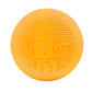 A round, orange biscuit with an embossed clock tower and buildings, inspired by Baobab’s Saint Tropez Body Wellness Collection and the lively summer essence of southern France.