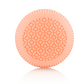A round, light orange item with a patterned surface and ridged edges from Baobab Collection Women Body Wellness Collection by Baobab, shown on a white background, evoking the softness of a women’s floral fragrance.