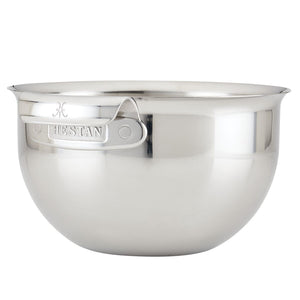 The Hestan Provisions 7qt Stainless Steel Mixing Bowl features a large capacity, reflective finish, sturdy handle, embossed branding, and is dishwasher safe for easy cleanup. Set against a plain white background.