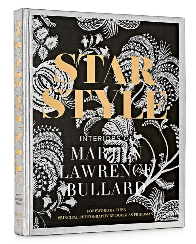 Cover of the Vendome book entitled "Star Style: Interiors of Martyn Lawrence Bullard," featuring eclectic interiors and floral patterns. Foreword by Cher and principal photography by Douglas Friedman.