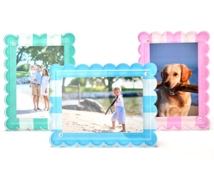 Three best-selling Tara Wilson Designs Scallop Stripe Frames in pastel blue and pink display family, beach child, and dog photos.