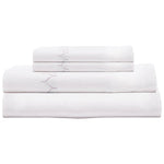 The John Robshaw Stitched Sheet Set in lavender is made from organic cotton percale and includes a subtle decorative stitched pattern.