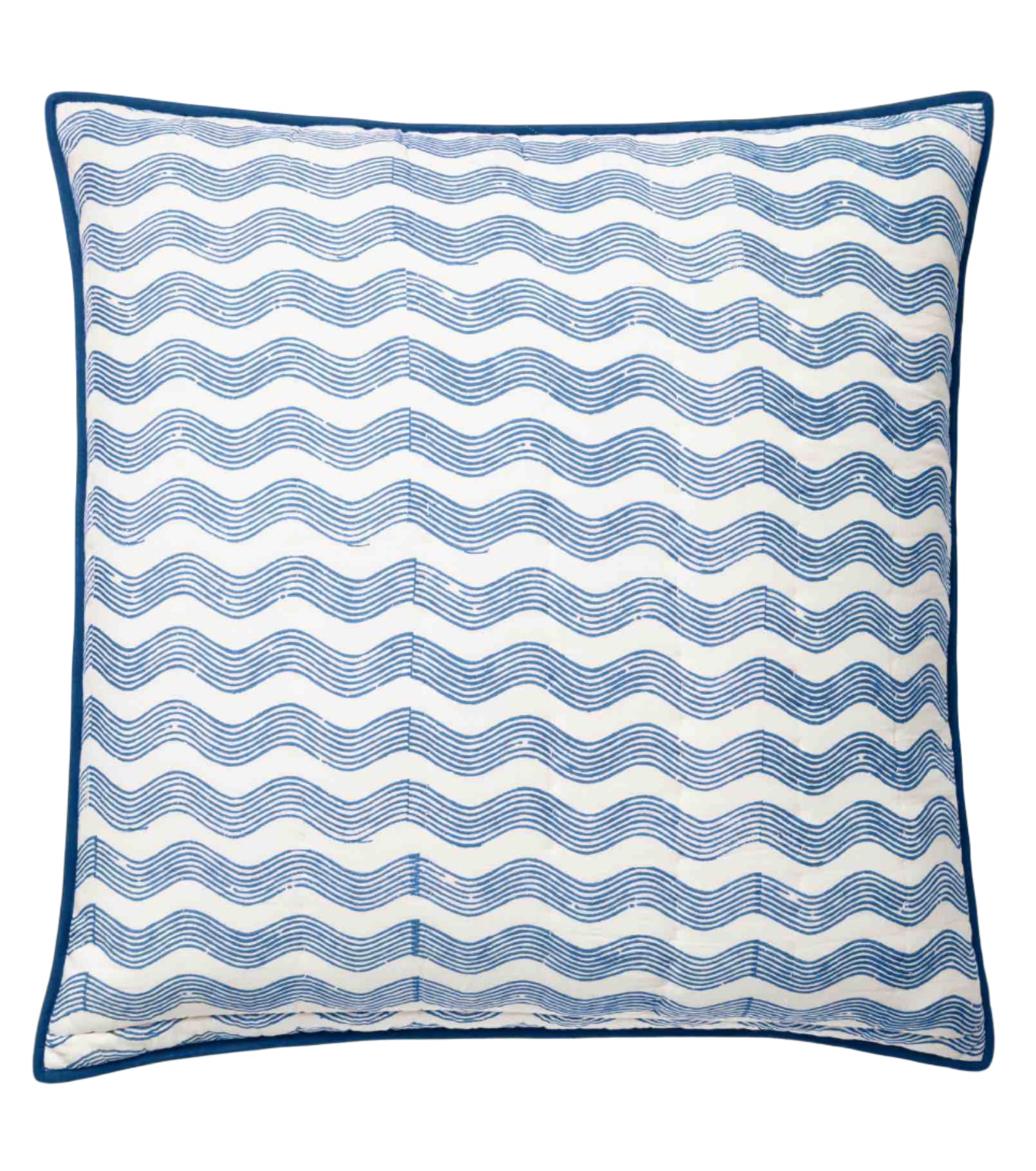 Part of Averylily’s Surfer Bedding Collection, this square throw pillow is made from soft cotton voile with blue and white wavy lines inspired by Hawaiian quilts, finished with a thin dark blue border and displayed on a plain white background.