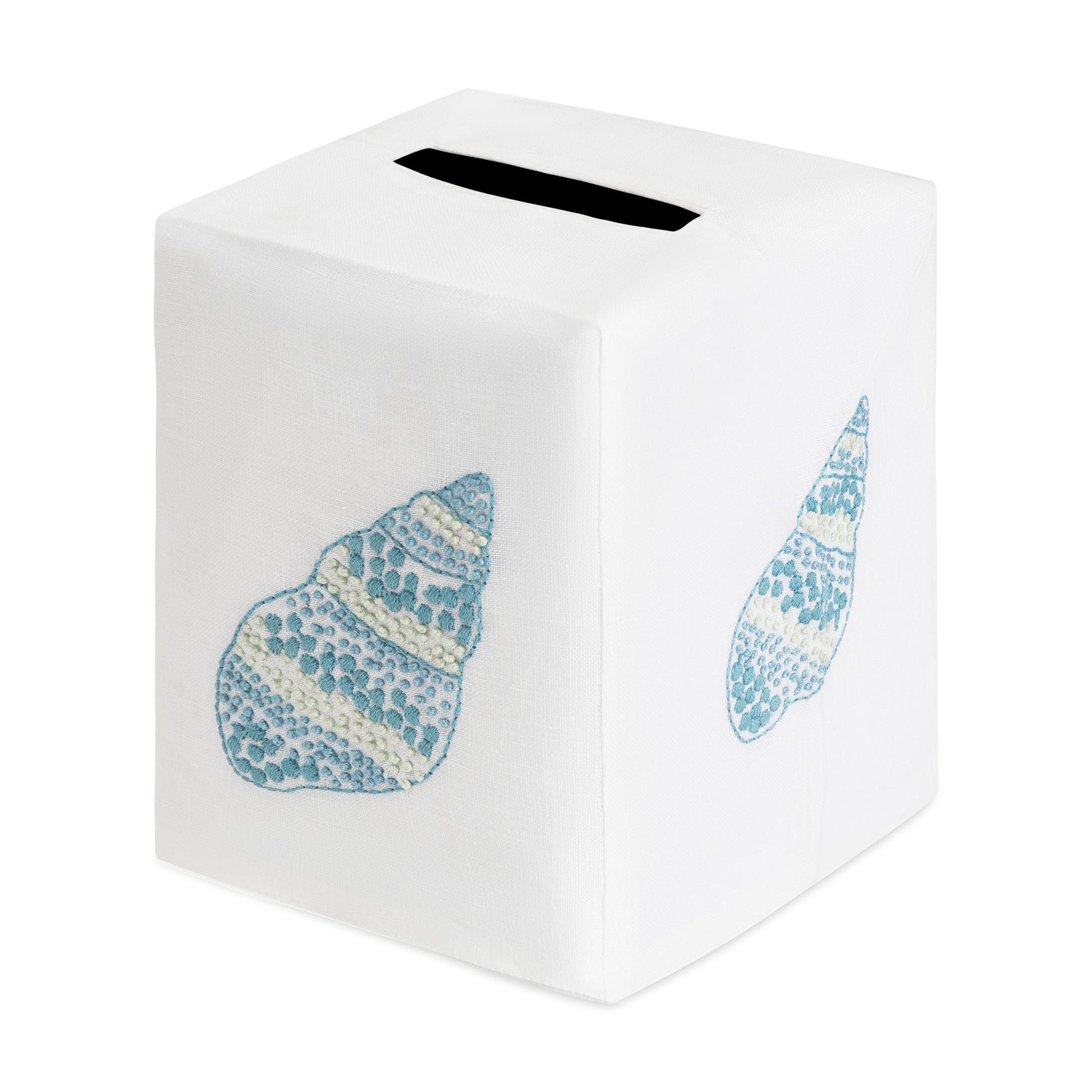 Elevate your space with the Haute Home Speckled Conch Coaster & Bath Collection’s white cube tissue box cover, featuring blue seashell designs on two visible sides and a convenient top opening for tissues—ideal for pairing with matching linen coasters or other coordinated decor to infuse your home with coastal elegance.