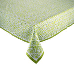 The Kim Seybert Alfresco Tablecloth features a green and white diamond geometric pattern with a contrasting border. Made from 100% cotton, it is crafted using traditional Indian block printing techniques.