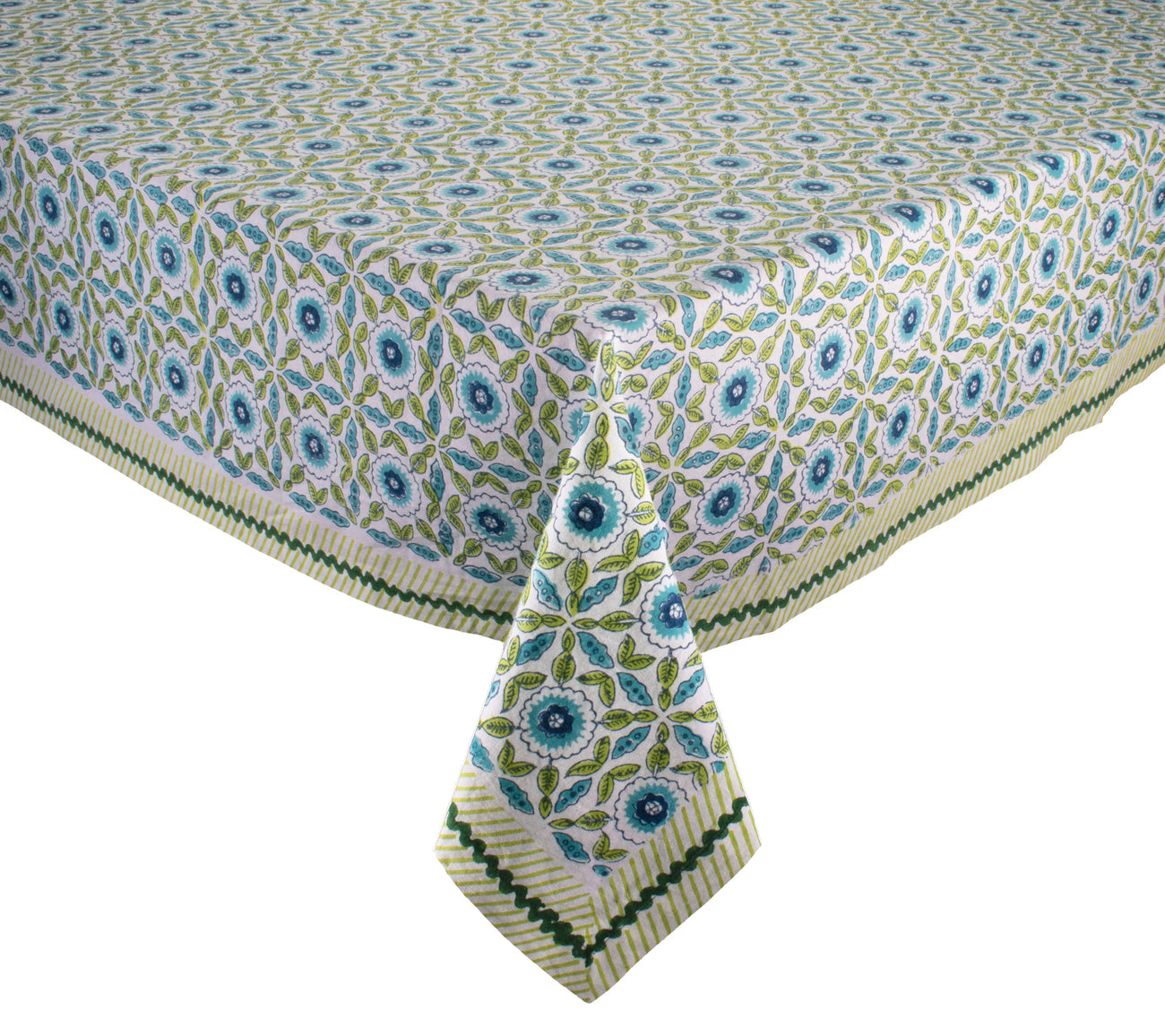 A rectangular table is adorned with the Kim Seybert Majorelle Tablecloth Collection, showcasing blue flowers, green leaves, and striped borders inspired by Indian block print designs.