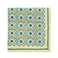 From the Majorelle Tablecloth Collection by Kim Seybert, this square cloth napkin features blue and green florals with green leaves and a striped border, handmade with Indian block-printing on crisp white.
