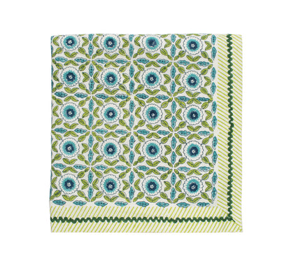 From the Majorelle Tablecloth Collection by Kim Seybert, this square cloth napkin features blue and green florals with green leaves and a striped border, handmade with Indian block-printing on crisp white.