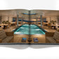 Open book displaying a photo of a luxurious indoor pool with lounge chairs and sunset views—a scene inspired by Terence Disdale’s yacht interiors, from "Terence Disdale: My Art of Yacht Design" by Assouline.