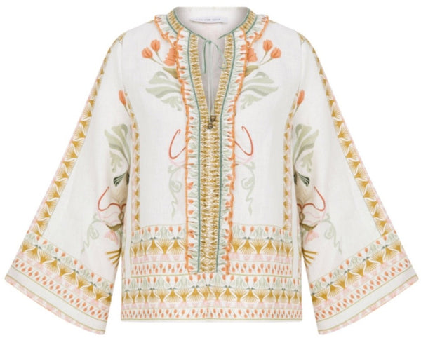 Embroidered bohemian style Lug Von Siga Tess Top with floral and geometric patterns and bell sleeves.