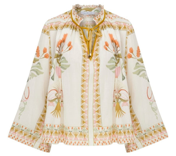 The Lug Von Siga Thea Top with a floral pattern, wide sleeves, and a drawstring neckline, rendered in pastel tones on a white background.