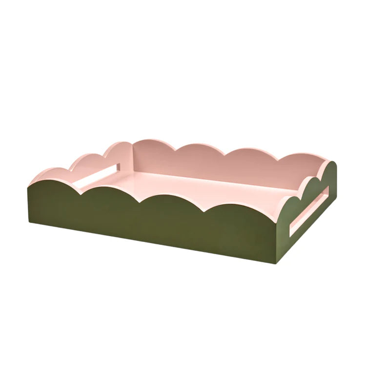 The Addison Ross Two-Tone Scalloped Lacquer Tray Collection features a rectangular tray with high-gloss olive green exterior, light pink interior, scalloped edges, and cutout handles on the shorter sides.