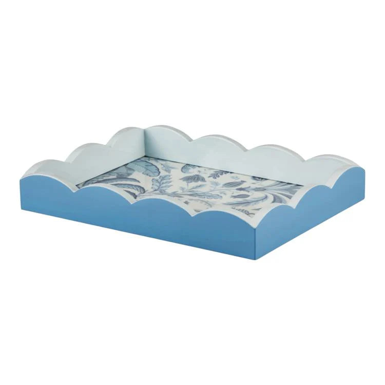 The Palm Beach Scallop Tray Collection by Addison Ross features a rectangular tray with scalloped edges, painted light blue with a high gloss lacquer finish and a blue-and-white floral patterned base.