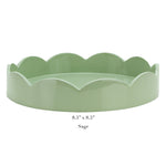 The Addison Ross Round Scalloped Lacquer Tray Collection features a sage green tray with scalloped edges, a high gloss lacquer finish, and measures 8.5” x 8.5”, displayed against a white background.