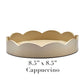 The Addison Ross Round Scalloped Lacquer Tray Collection offers an 8.5"x8.5" round tray in cappuccino, featuring a scalloped edge and a high gloss lacquer finish.