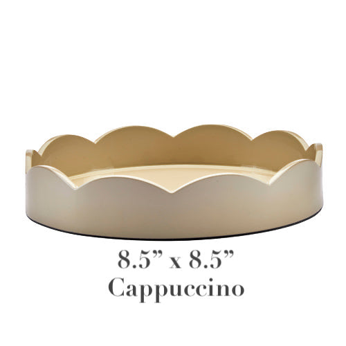 The Addison Ross Round Scalloped Lacquer Tray Collection offers an 8.5"x8.5" round tray in cappuccino, featuring a scalloped edge and a high gloss lacquer finish.