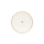 The Sugar Paper Small Round Heart Trinket Tray is a white ceramic dish featuring an elegant gold rim and a delicate gold heart at its center, beautifully photographed on a plain white background to highlight its sophisticated gold details.