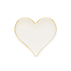 The Bordered Heart Trinket Tray by Sugar Paper is a white, heart-shaped ceramic piece featuring elegant gold details along its thin rim, shown against a plain white background.