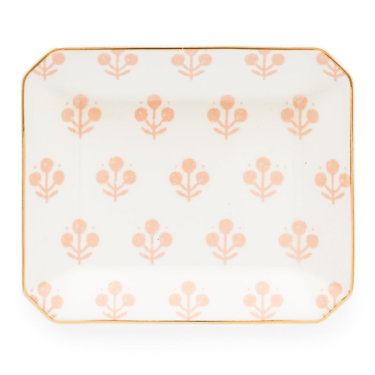 The Rose Floral Trinket Tray by Sugar Paper is a rectangular white ceramic tray with rounded corners, featuring a repeating light pink floral pattern and elegant gold detailing along the edge.