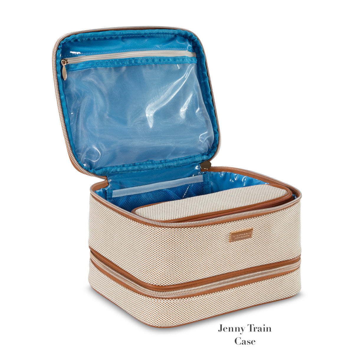 The Tropea Travel Collection by Stephanie Johnson is a beige and tan zippered train case with a blue interior lining, removable compartments, and a transparent pocket inside the lid.