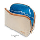 The Stephanie Johnson Tropea Travel Collection makeup bag features a beige textured exterior, gold zipper, blue interior lining, and removable compartments—stylishly designed for organized travel.