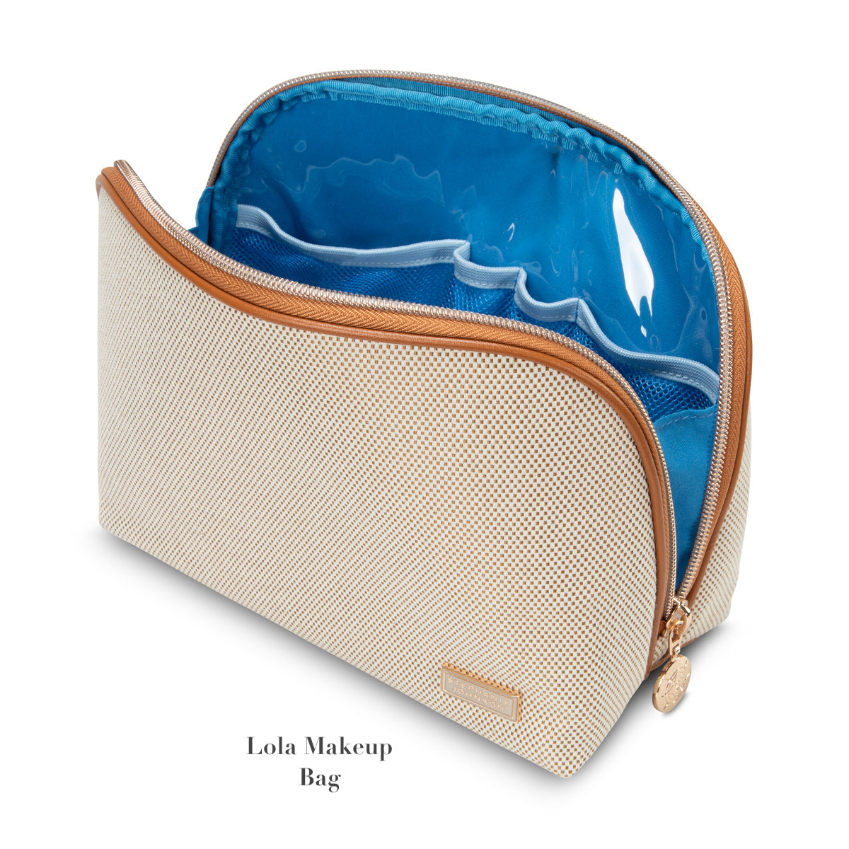 The Stephanie Johnson Tropea Travel Collection makeup bag features a beige textured exterior, gold zipper, blue interior lining, and removable compartments—stylishly designed for organized travel.