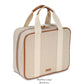 The Tropea Travel Collection by Stephanie Johnson is a beige and tan fabric briefcase with brown trim, two short handles, a zip closure, and removable compartments for versatile use.