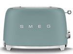 The Smeg 2-Slice Toaster Collection features a pastel blue retro design with two slots, chrome accents, a control knob on the right side, and the Smeg logo displayed on the front.