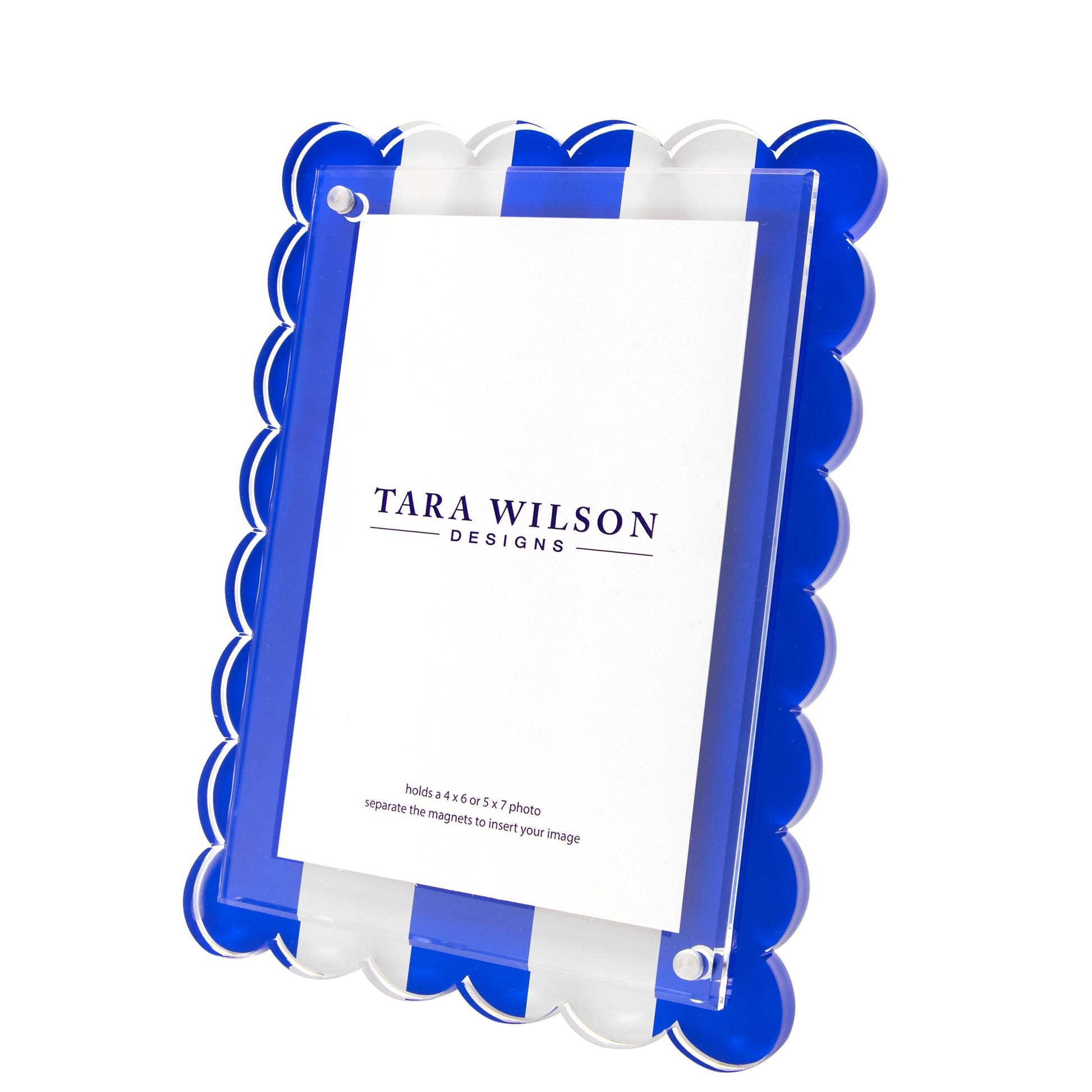 The Scallop Stripe Frame by Tara Wilson Designs features a blue and white scallop stripe border and is one of our best-sellers.