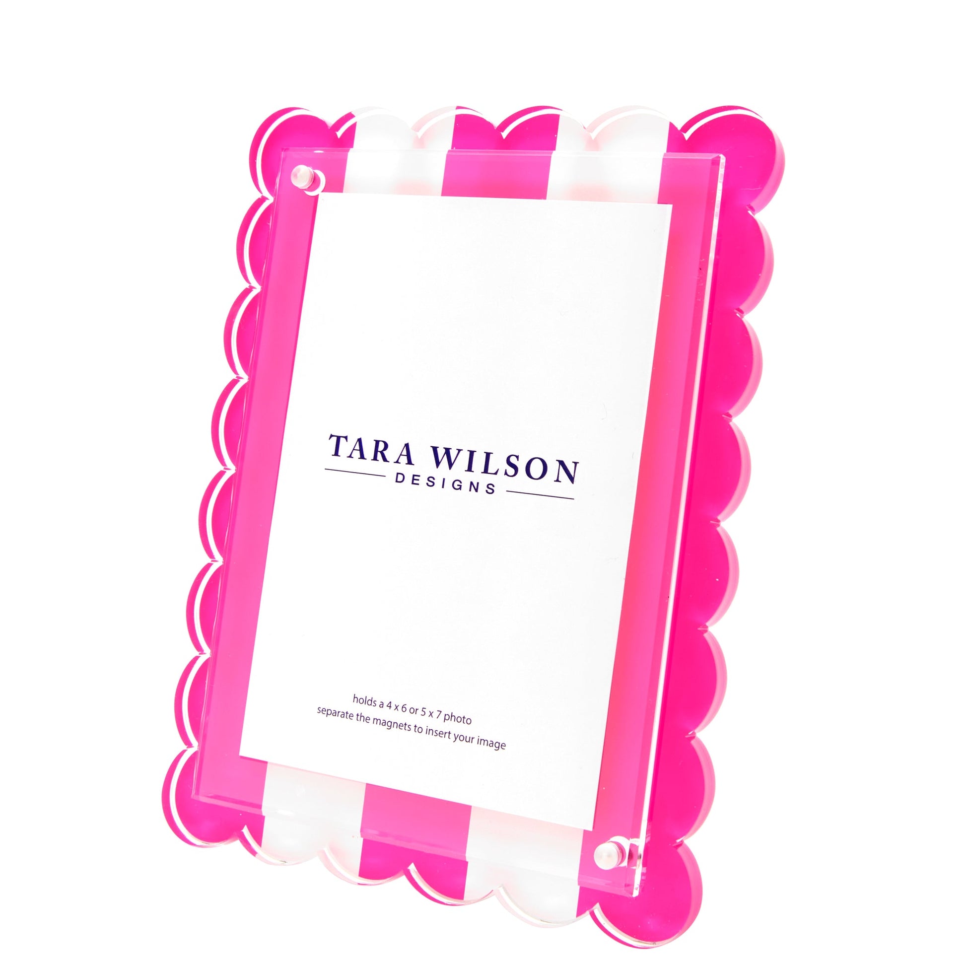 The Tara Wilson Scallop Stripe Frame by Tara Wilson Designs features pink and white stripes with a scalloped edge, making it a best-selling statement piece for any space.