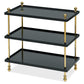 The Bunny Williams Tiered Drinks Table features three tiers, gold metal poles, and decorative brass finials—an elegant conversation starter for your space.