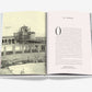 An open book by Assouline entitled "The Surf Club" displays a black-and-white photo of a building under construction on the left page and text titled "The Founders" on the right page, offering a glimpse into the luxurious history of The Surf Club in Miami.