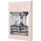 The Boca Raton: A Century of Being Iconic by Assouline features a hardcover with a black-and-white photo of a woman beside a bicycle and gold spine lettering, celebrating the legacy of the famed luxury resort.