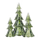 The Juliska Berry & Thread Evergreen Tree Collection features three green glass trees of varying heights, beautifully displayed on a white background—ideal as festive holiday table decor.