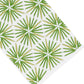 Radiant Bath Collection by Haute Home—white Italian linen fabric featuring a repeating pattern of green palm leaf shapes arranged in rows, photographed from an angled top-down perspective; an elegant choice for sophisticated home décor.