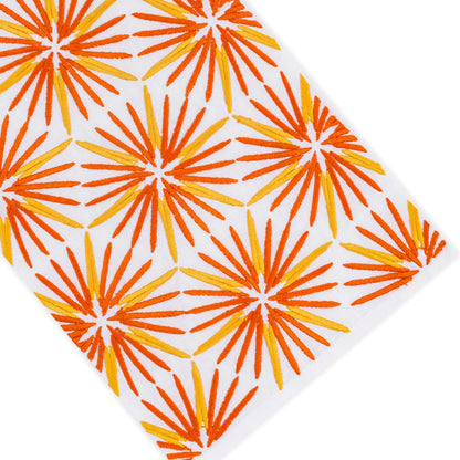 White surface with an angled pattern of orange and yellow starburst shapes evenly spaced across the image, evoking the timeless elegance of premium linen for refined home décor in the Haute Home Radiant Bath Collection.