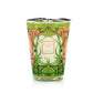 This Baobab Collection Tomorrowland Candle, presented in a glass holder, showcases intricate green and pink Art Nouveau-inspired patterns. It features a captivating aroma that elegantly embodies the essence of Tomorrowland.