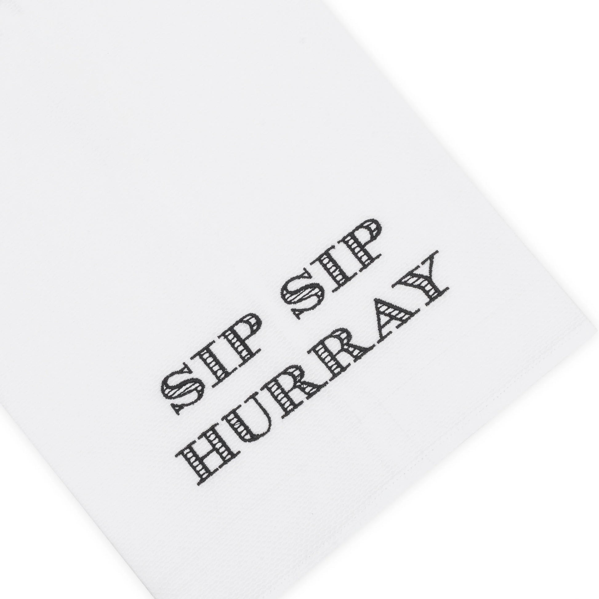 The Haute Home Sip Sip Hurray Tip Towel is a 20 x 25 cm white cotton pique napkin printed with "SIP SIP HURRAY" in bold black uppercase letters.