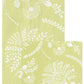 Two Trailing Floral Pale Green napkins by Caspari, featuring a white botanical leaf and fern design, with one napkin partially overlapping the other.