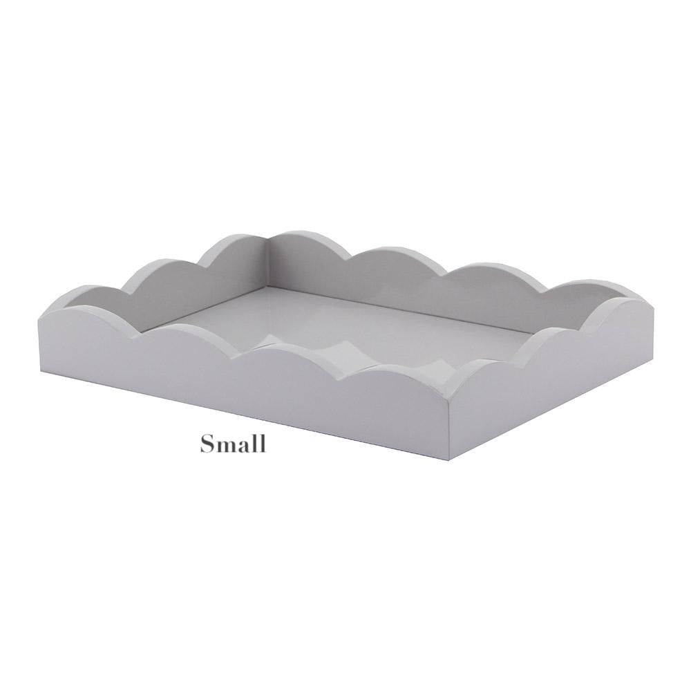 The Addison Ross Scalloped Chiffon Lacquer Tray Collection features small, rectangular trays with scalloped edges and a high-gloss lacquer finish, shown against a plain background.