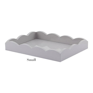 The Addison Ross Scalloped Chiffon Lacquer Tray Collection features small, rectangular trays with scalloped edges and a high-gloss lacquer finish, shown against a plain background.