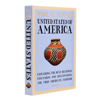 Assouline’s "Wine & Travel USA" features a cover with a decorated vase and explores regional vineyards and US wine culture.