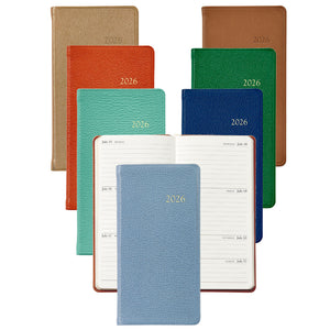 Eight planners from the 2026 Pocket Journal Planner Collection by Graphic Image are displayed in various colors, with one open to show lined pages for July 13–19—ideal as a personal pocket journal or Smyth sewn diary.