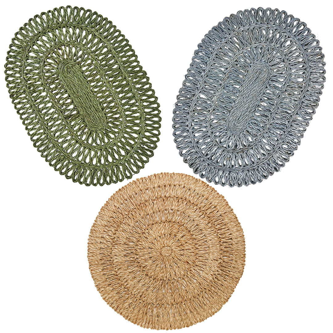 Juliska’s Straw Loop Placemat Collection includes two oval green and gray placemats and one round natural beige, all handwoven with beautiful texture, displayed on a white background.